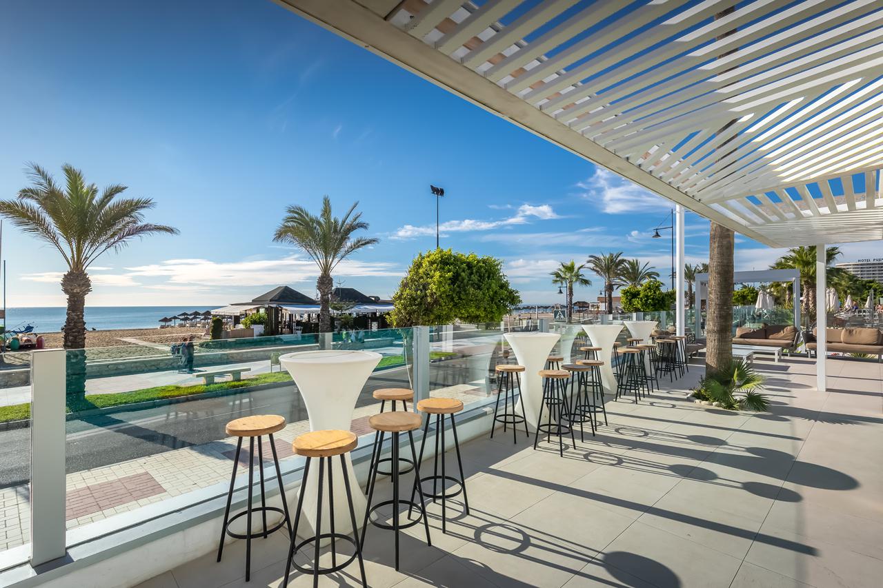 Buitenterras in de tuin van Occidental Torremolinos Playa